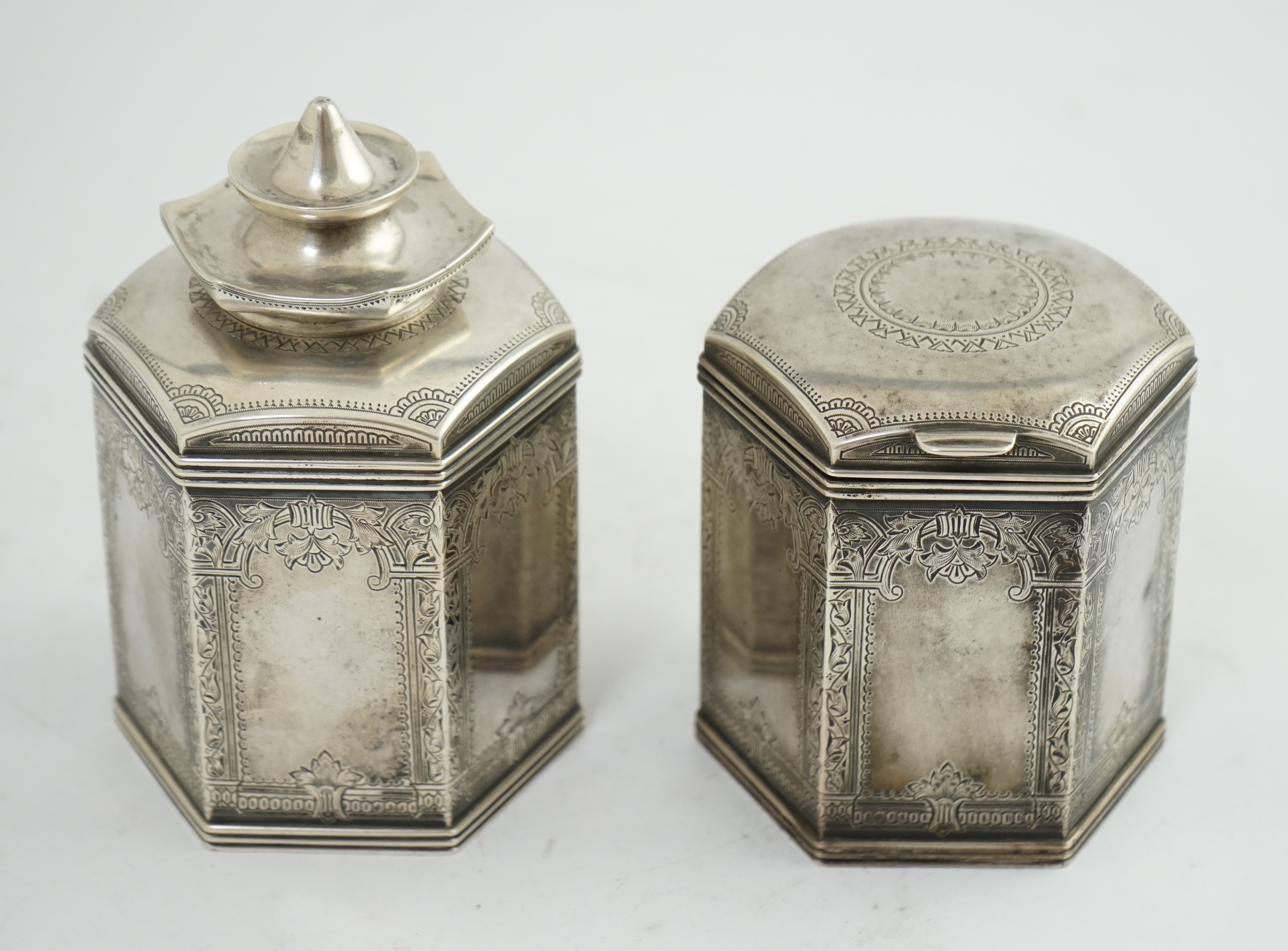 Two similar late 19th/early 20th century Russian 84 zolotnik silver tea caddies, master Varvara Baladanov